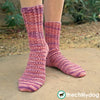 Azalea Socks Pattern - A feminine, top down, knit sock pattern with pretty stitch details including twisted ribbing around the leg, eyelets across the foot and yarn over short row heels and toes