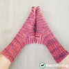 Azalea Socks Pattern - A feminine, top down, knit sock pattern with pretty stitch details including twisted ribbing around the leg, eyelets across the foot and yarn over short row heels and toes