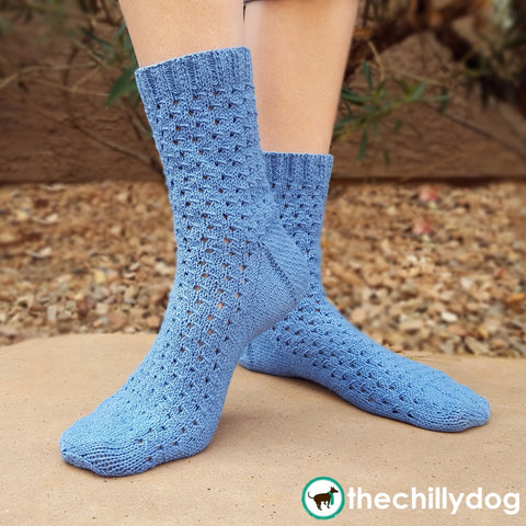 Like a Wink and a Smile Socks - Feminine, lacy, cuff down sock knitting pattern with an eye of partridge heel flap